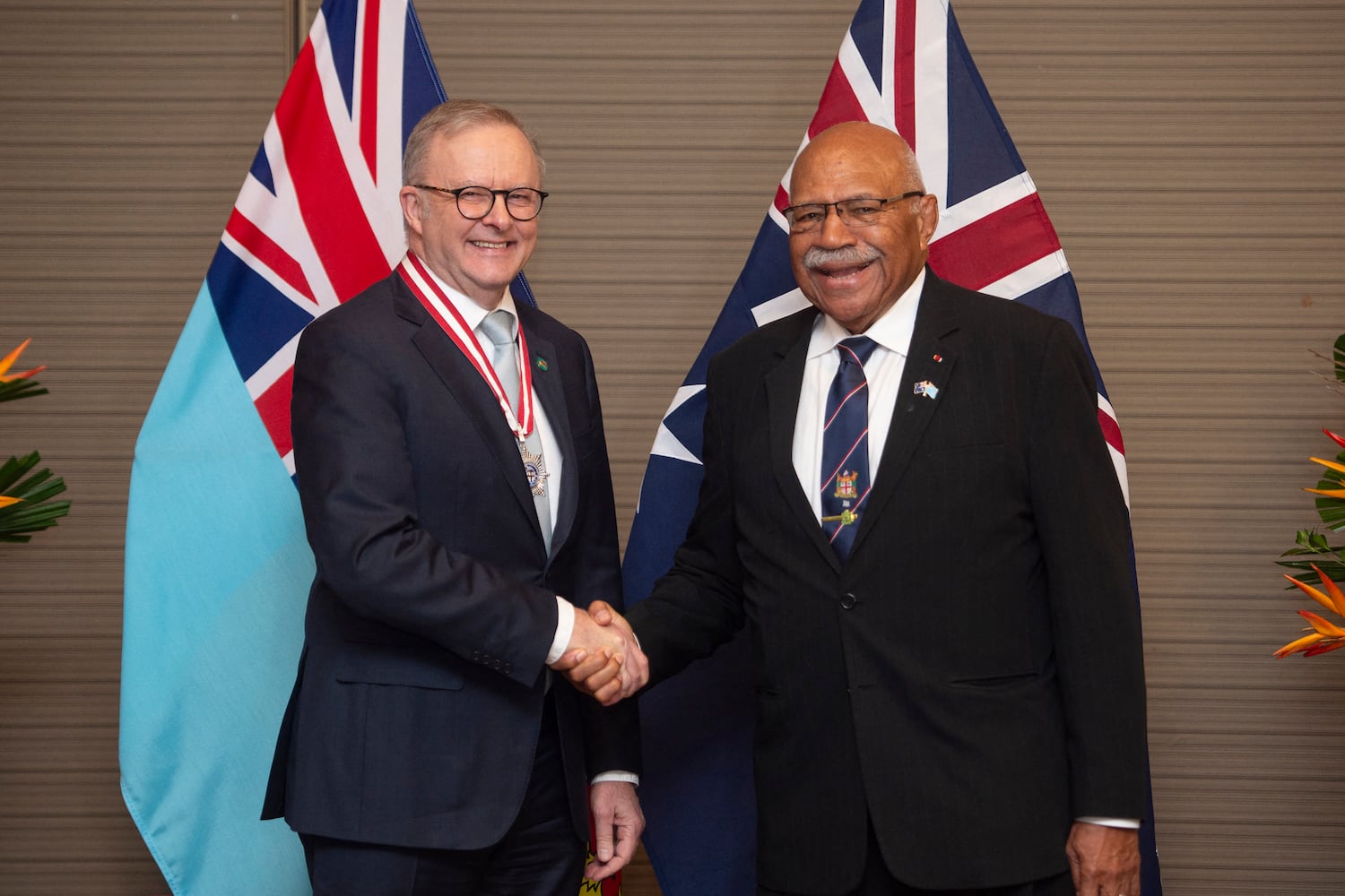 Australian Prime Minister Anthony Albanese shakes hands with Fiji's Prime Minister Sitiveni Rabuka before a bilateral meeting at the Grand Pacific Hotel in Suva on July 6, 2026.