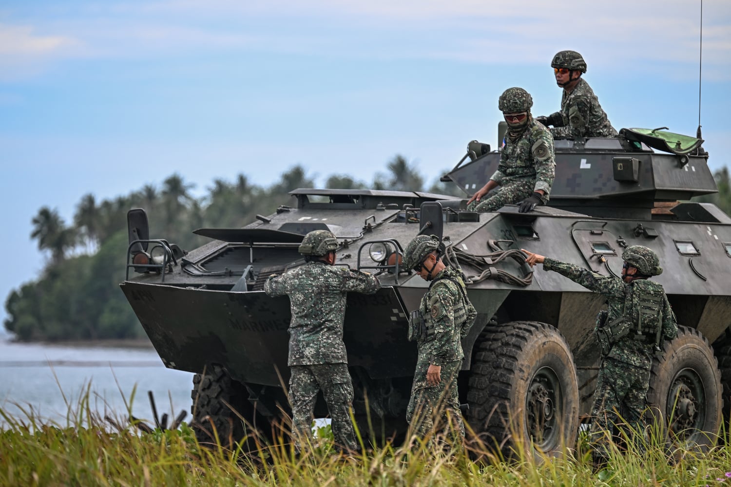 Philippine military servicemen take part in a counter-landing live fire exercise during the annual US-Philippines joint military 