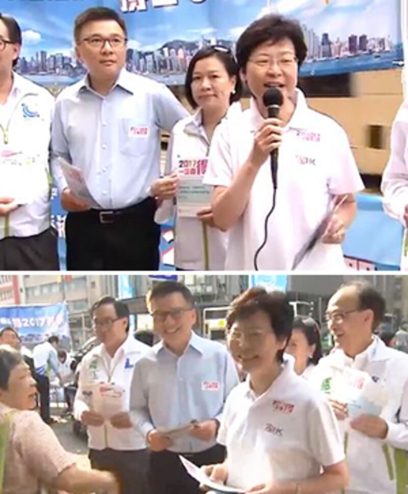 2015年4月29日,政務司司長林鄭月娥及財經事務及庫務局局長陳家強,到荔枝角港鐵站外向市民宣傳政改,希望市民踴躍發表意見,令立法會在表決政改時獲議員支持通過。(政府新聞網截圖)