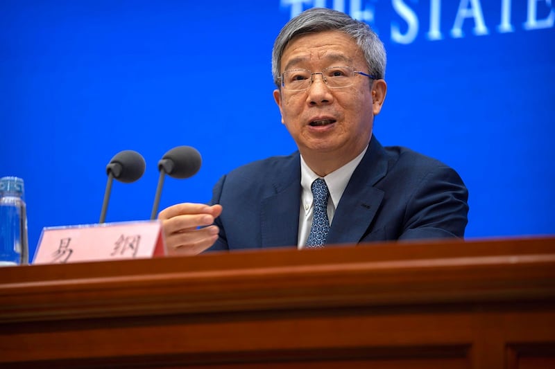 2023年3月3日,时任中国人民银行行长易纲在北京国新办举行的新闻发布会上。(美联社)