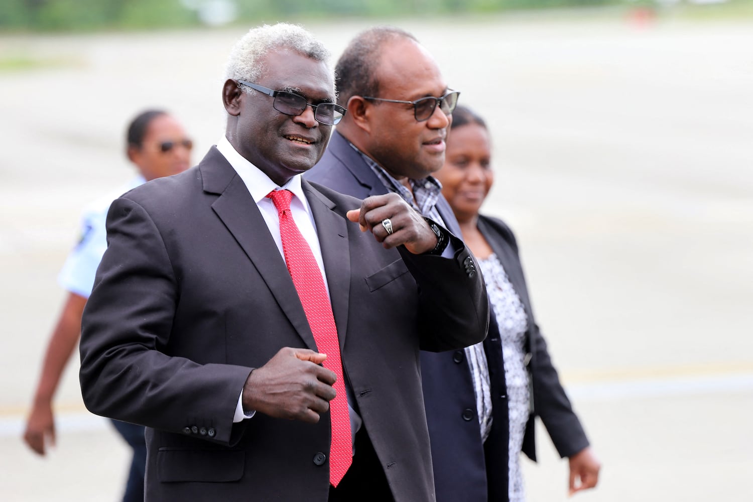 Solomon Islands' Deputy Prime Minister Manasseh Maelanga, right, receives Prime Minister Manasseh Sogavare in Honiara on July 17, 2023, after returning home from a seven-day trip to China. Maelanga filed a no-confidence motion against the leadership of current Prime Minister Matthew Wale, while Sogavare, as leader of the opposition, alleged that the no confidence motion was withdrawn due to foreign interference.
