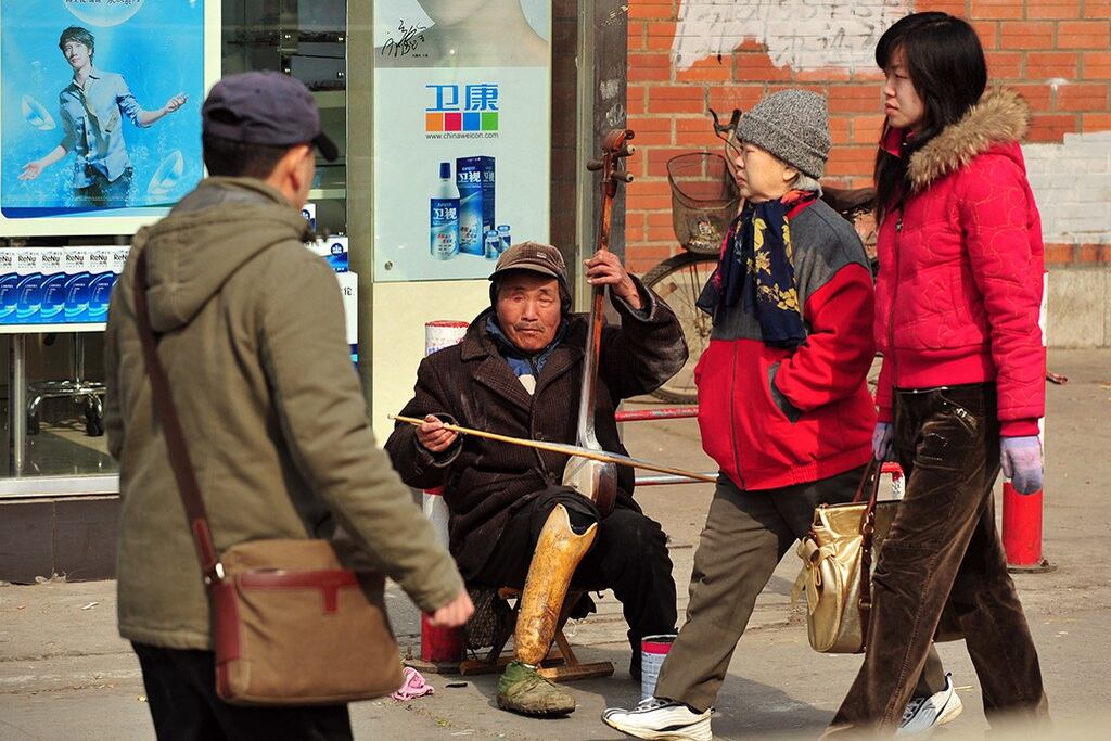 每人四十元 北京向三十多万穷人发补贴 网民:不如乞丐讨得多 – 普通话主页