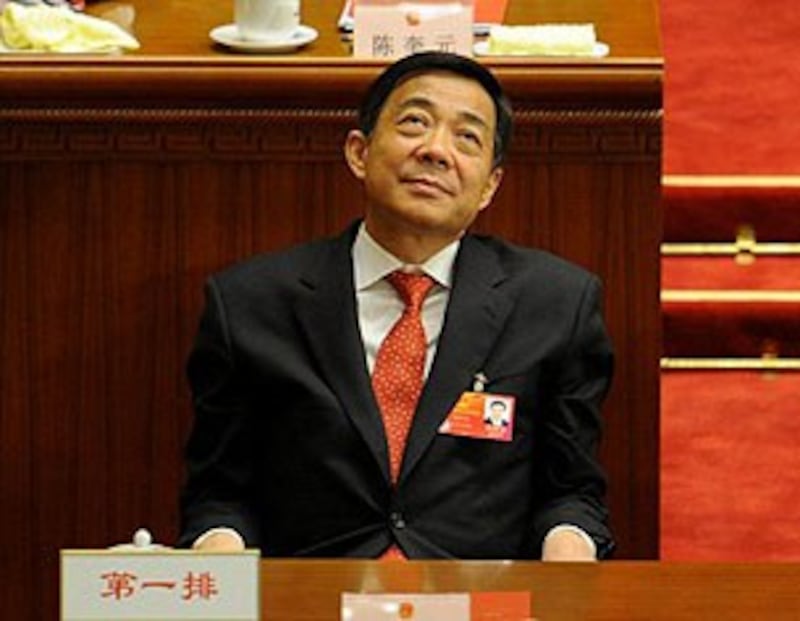 图片:2012年3月14日,重庆市委书记薄熙来在人大闭幕式上。(法新社)