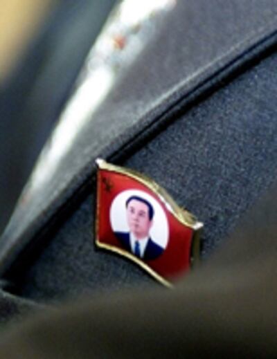kim_badge-200.jpg