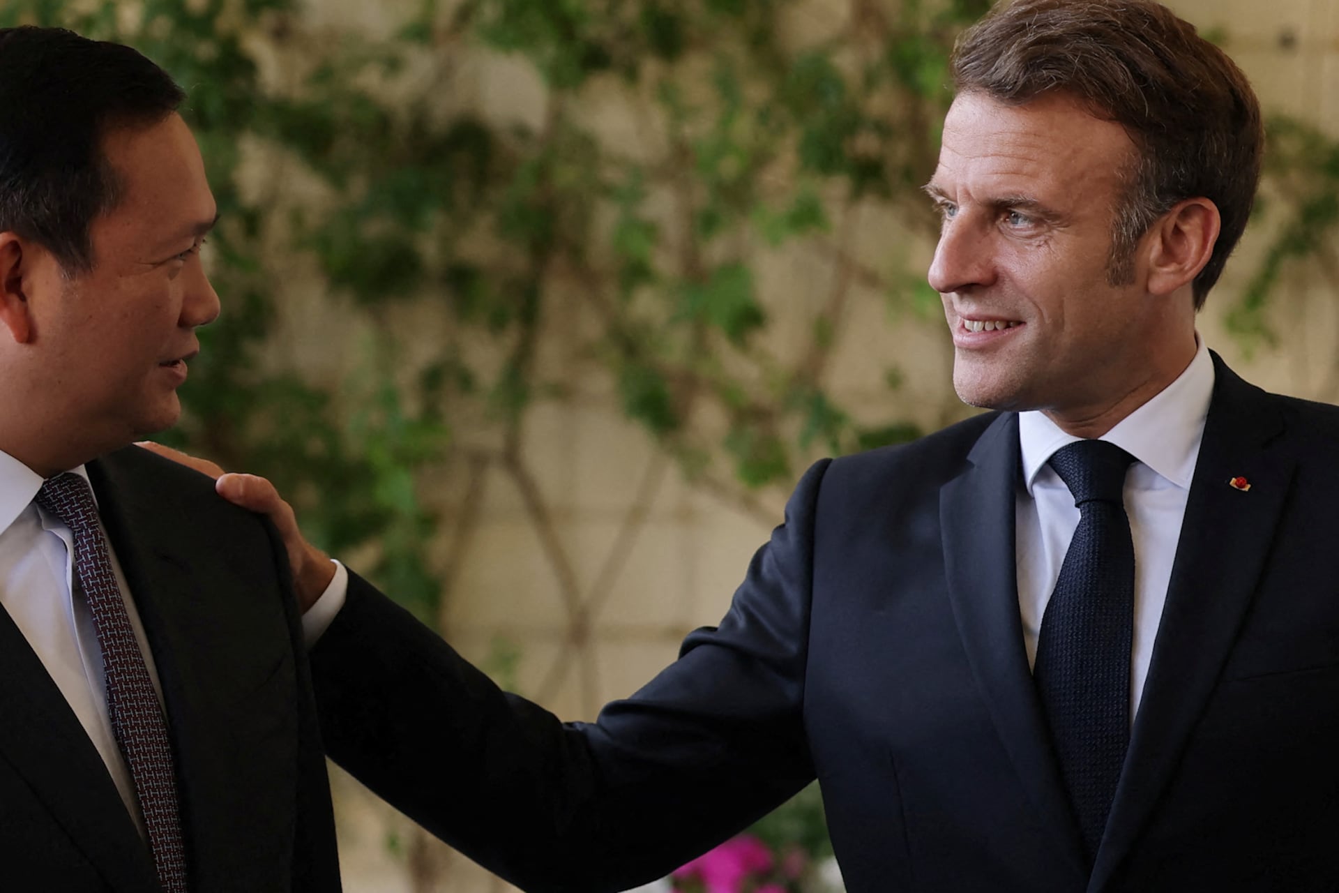 French President Emmanuel Macron (R) welcomes Cambodia's Prime Minister Hun Manet ahead of their meeting at the Prefecture on the sideline of the United Nations Ocean Conference (UNOC3), in Nice, on June 10, 2025.