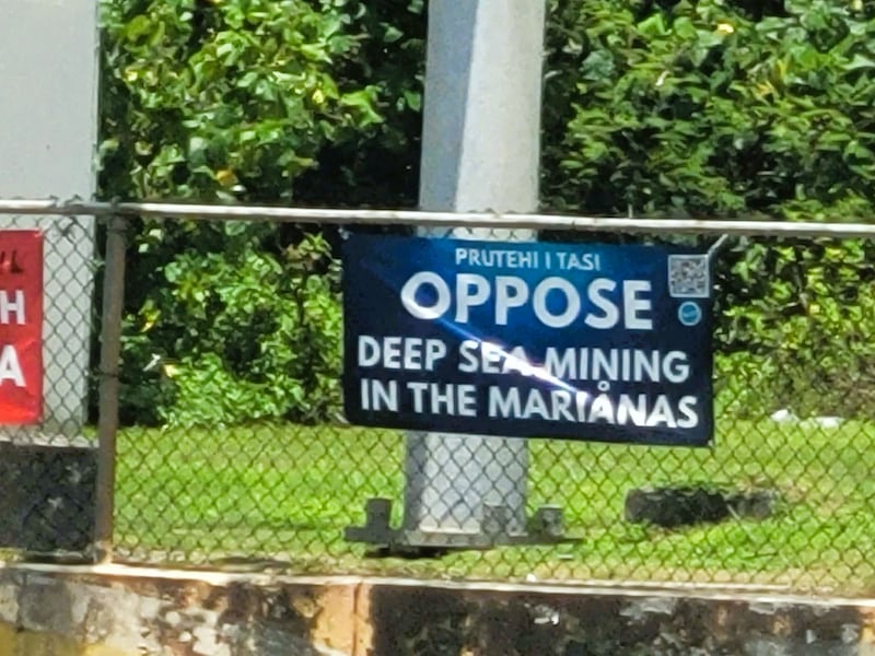 This undated photo shows a sign protesting deep sea mining in the Marianas.