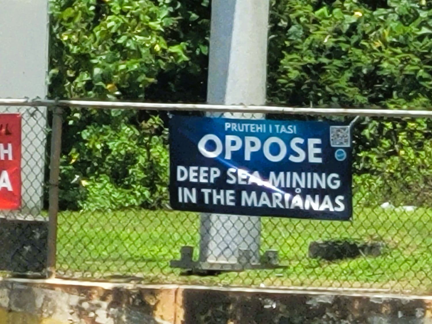 This undated photo shows a sign protesting deep sea mining in the Marianas.