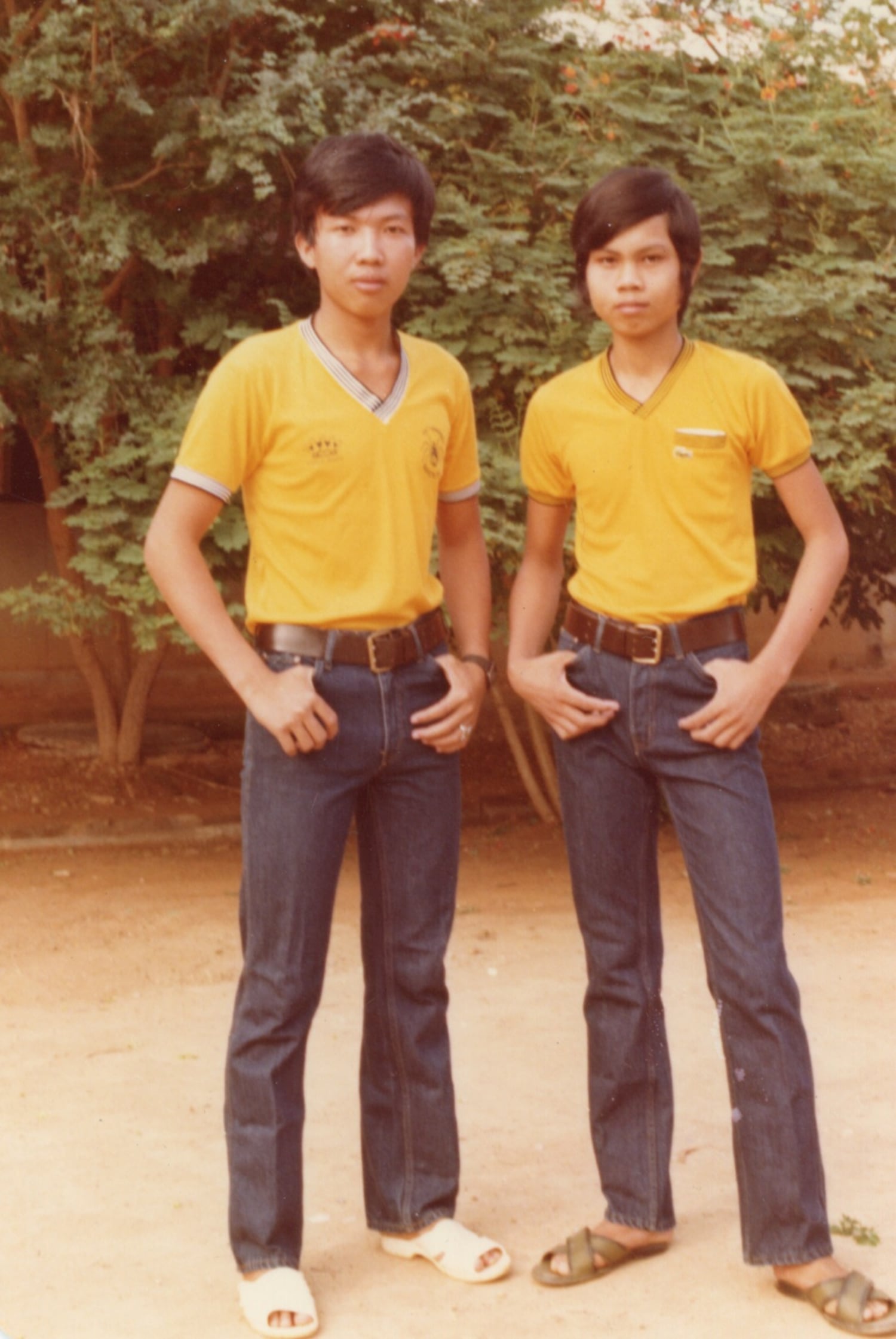 Poly Sam, right, and his childhood friend in 1982 at the Kamput Refugee Camp in Thailand.