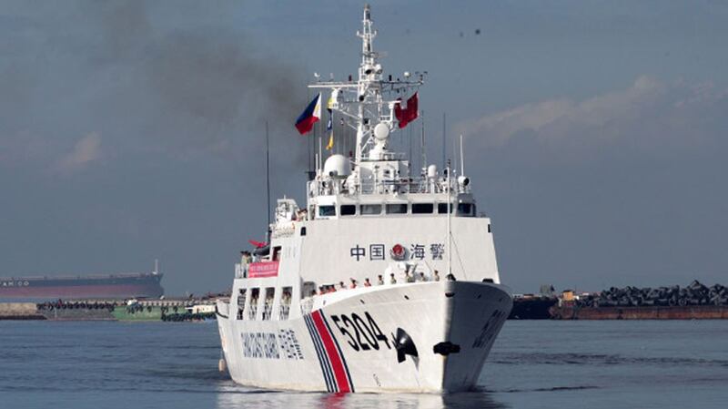 China's Coast Guard ship 5204 prepares to anchor at Manila port, Jan. 14, 2020.
