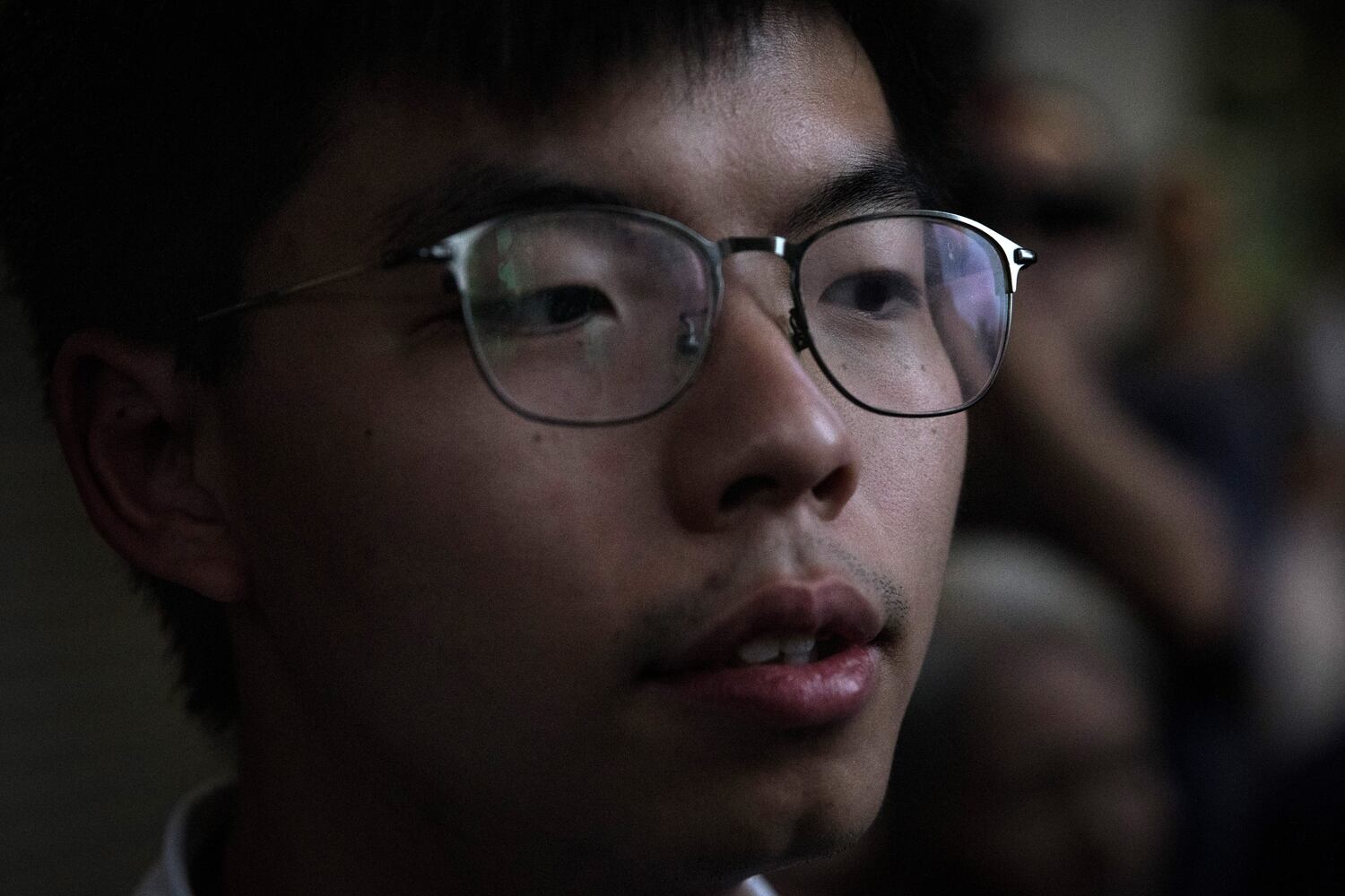 Hong Kong pro-democracy activist Joshua Wong speaks to the media after being arrested and released on bail on August 30, 2019 in Hong Kong. (Chris McGrath/Getty Images)
