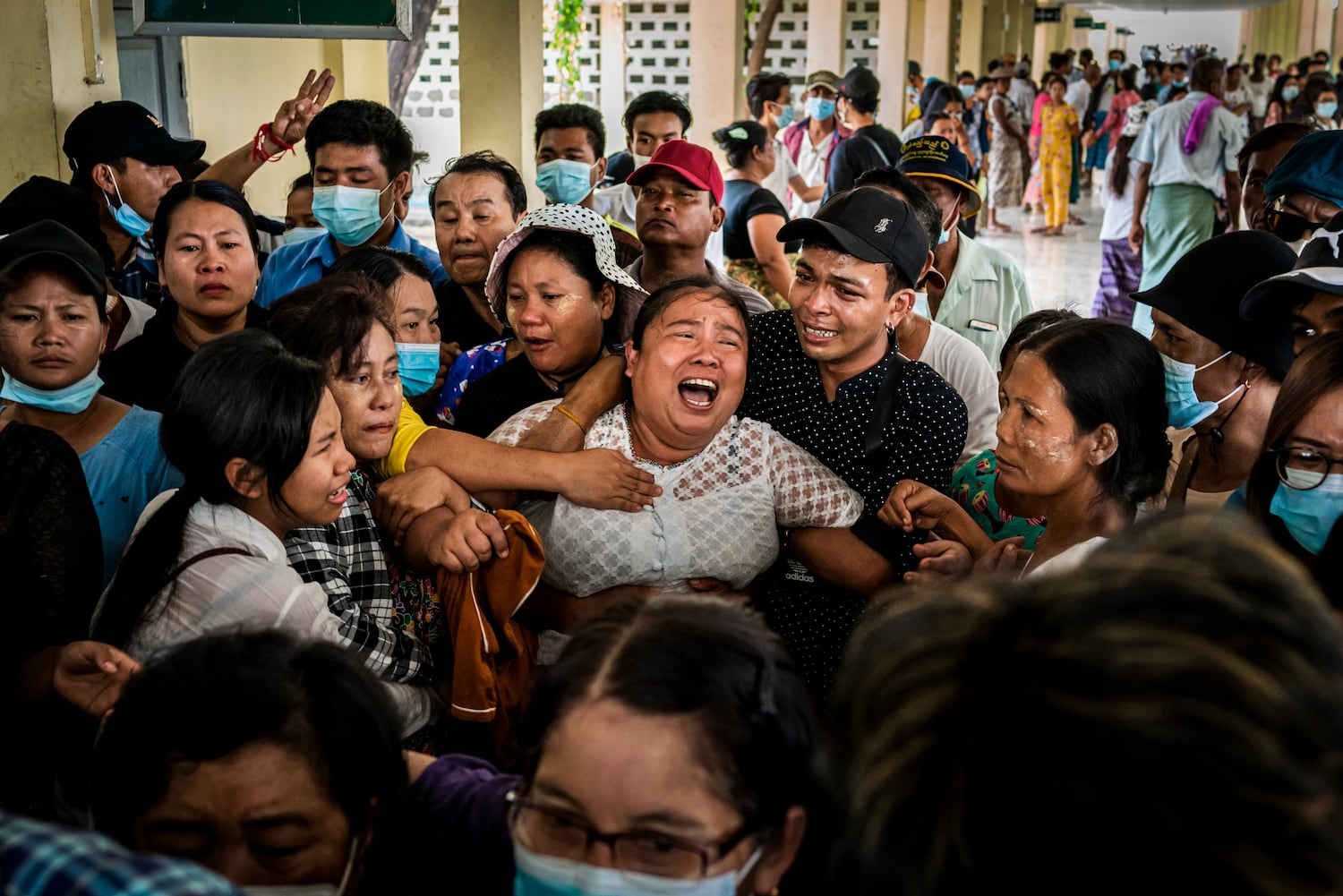 The mother of Aung Kaung Htet wails while mourning during a funeral for Aung, 15, who was killed when military junta forces opened fire on anti-coup protesters, on March 21, 2021 in Yangon, Myanmar.
