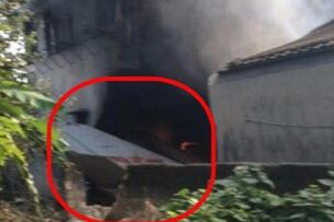 图片:歼七战机汕头坠落撞民居起火。(新浪网友提供)