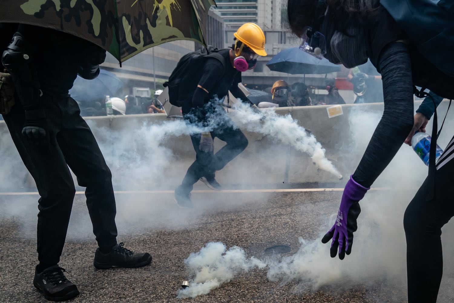 Protesters standoff with police in cloud of tear gas during a clash at an anti-government rally outside of Central Government Complex on August 31, 2019 in Hong Kong.