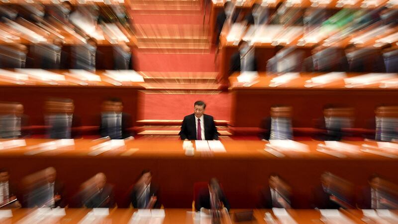 资料图片：2021年3月10日，习近平在北京人民大会堂举行的政协会议（CPPCC）闭幕式上。 （AFP）