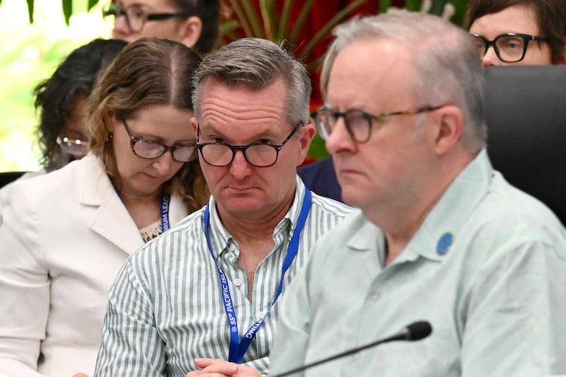 Australian Minister for Climate Change and Energy Chris Bowen, center, looks towards Australian Prime Minister Anthony Albanese, right, during the Pacific Islands Forum Leaders' plenary meeting in Koror on September 2, 2026.