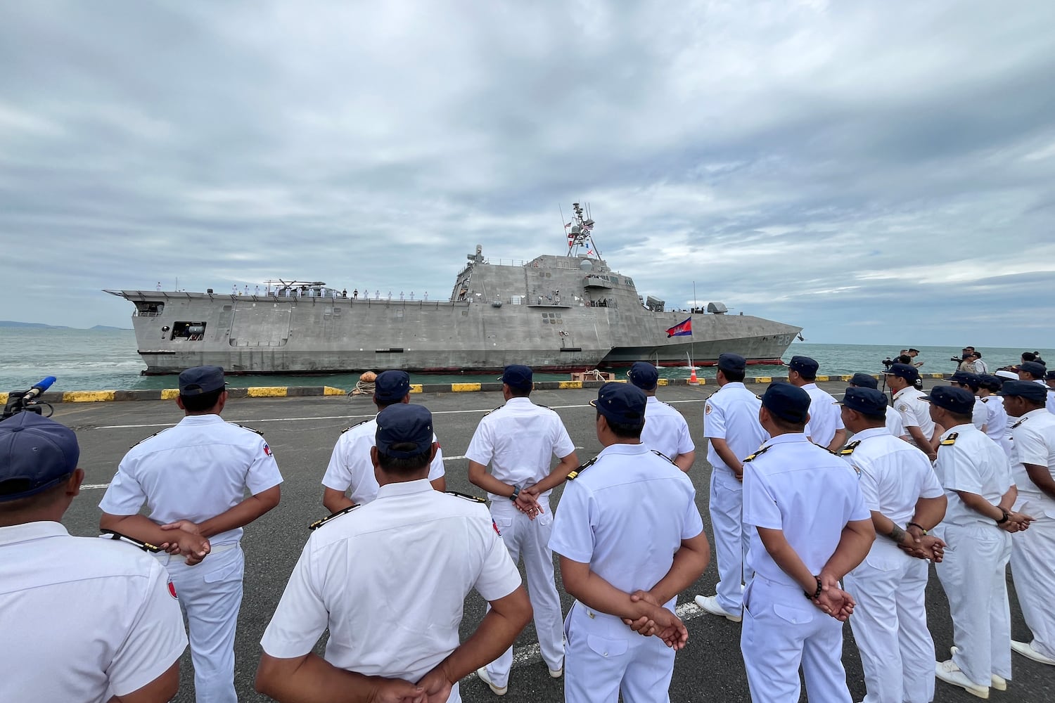 Royal Cambodian Navy personnel line up as the USS Savannah combat ship docks in Cambodia's southern port city of Sihanoukville on Dec. 16, 2024.