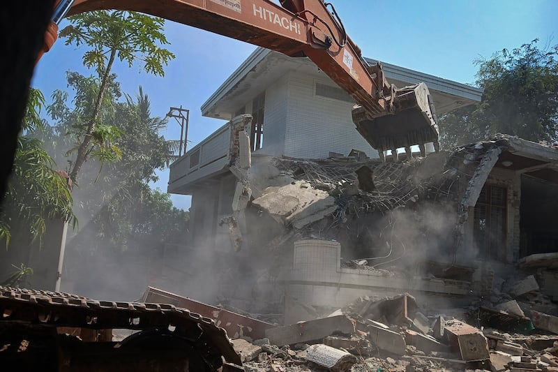 An earthquake damaged pre-school is demolished in Sagaing city, Myanmar, on April 24, 2025, four weeks after Myanmar's devastating earthquake.