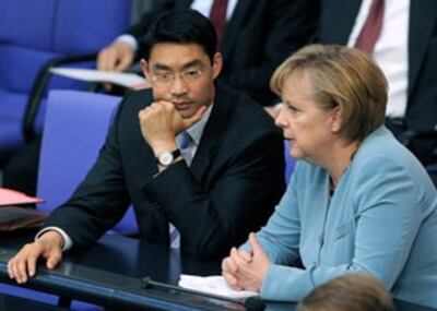 Ông Philipp Roesler và nữ Thủ tướng Đức Angela Merkel