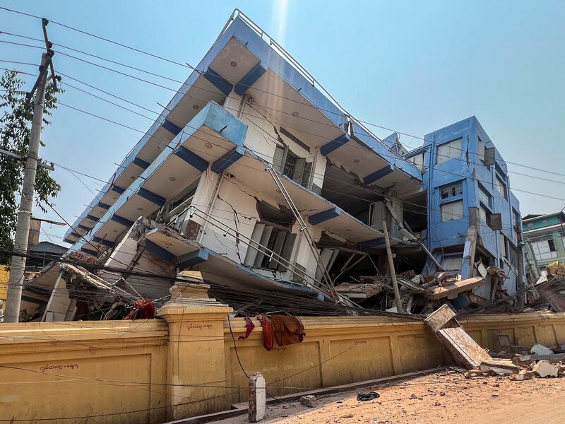 A general view of a building that collapsed, in the aftermath of a strong earthquake, in Mandalay, Myanmar, March 30, 2025. REUTERS/Stringer     TPX IMAGES OF THE DAY