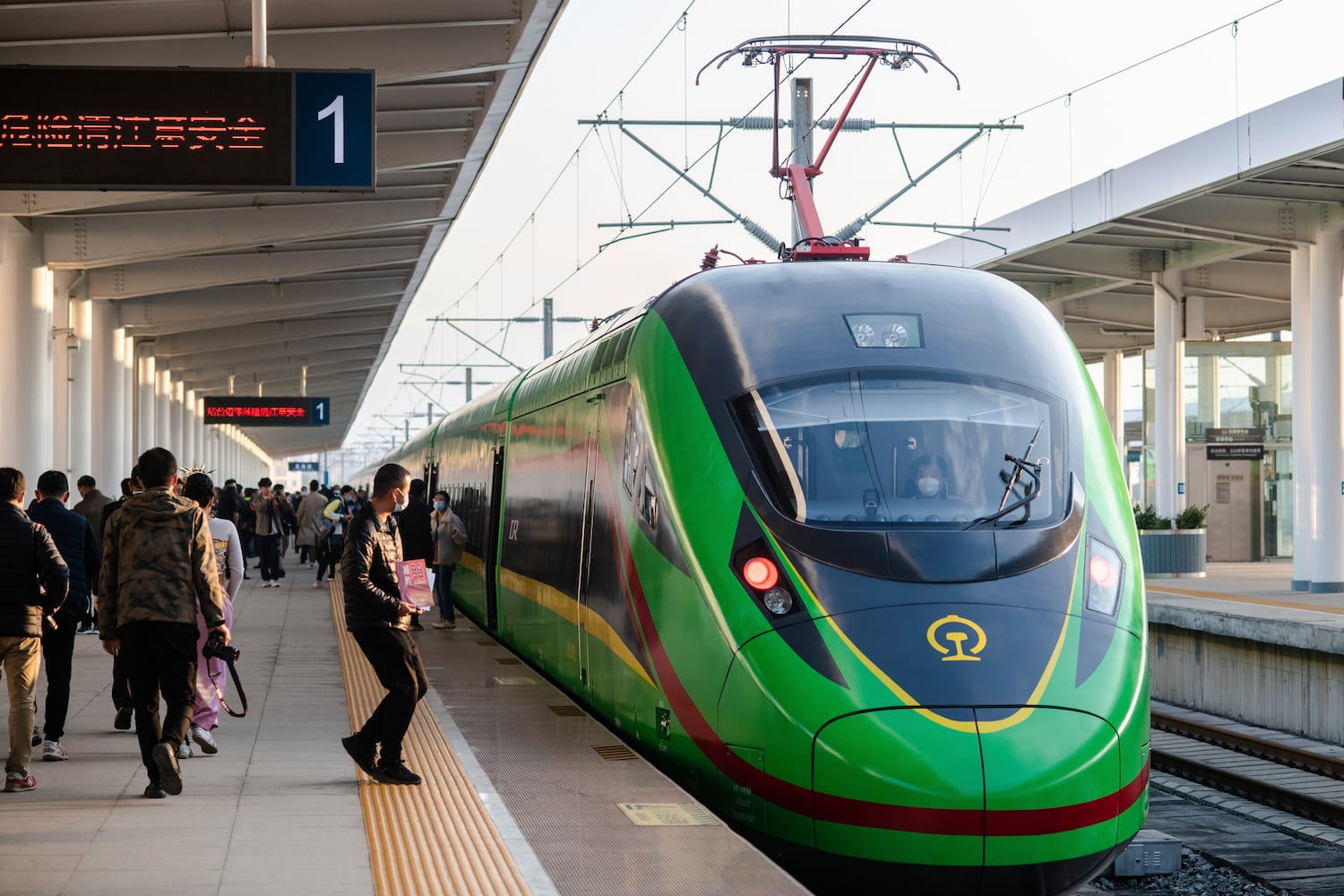 In this photo released by Xinhua News Agency, an electric multiple unit (EMU) train of the China-Laos Railway -- one of hundreds of projects under the Belt and Road Initiative -- arrives at Yuxi Railway Station in Yuxi in southwestern China's Yunnan Province, Friday, Dec. 3, 2021. (Hu Chao/Xinhua via AP)
