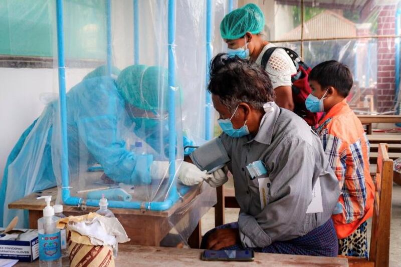 2021-07-13T093345Z_375857659_RC2GJO9VU7FS_RTRMADP_3_HEALTH-CORONAVIRUS-MYANMAR-COUP.JPG