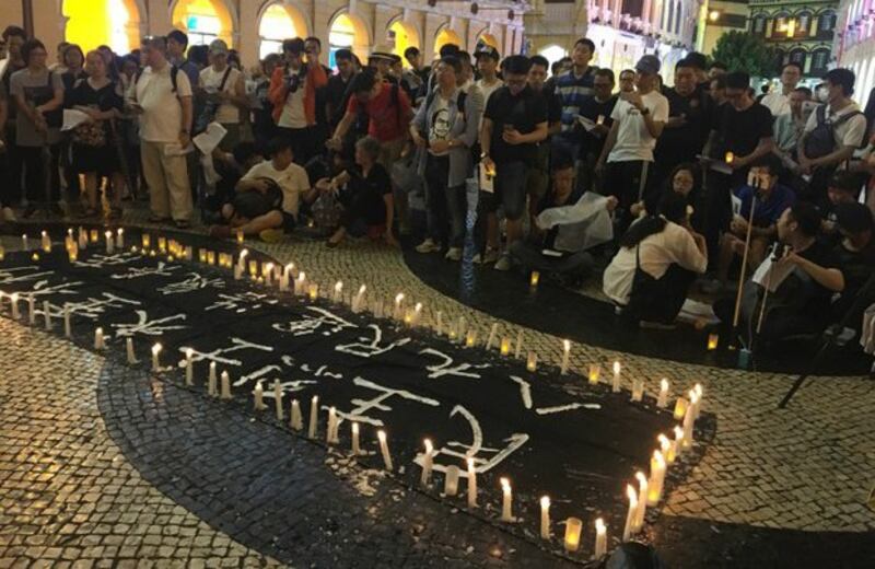 2018年6月4日，澳门“民联会”在市中心举行六四烛光集会， 约两百人出席。（区锦新独家提供/资料照）