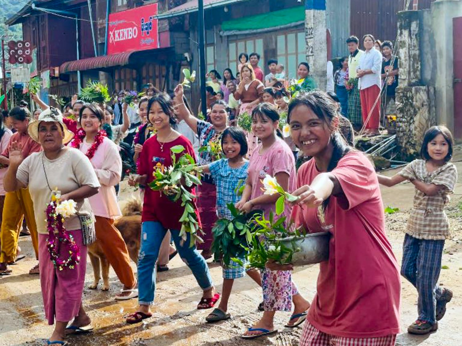 Residents of Mogoke, Mandaly region, Myanmar, greet the Ta’ang National Liberation Army after they took control of the town, July 24, 2024.