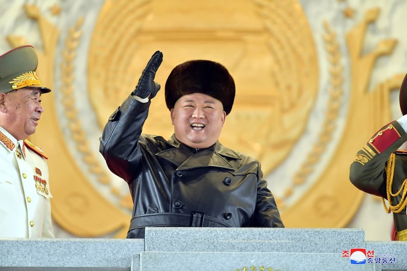 Kim Jong Un waves during a ceremony for the 8th Congress of the Workers' Party in Pyongyang, North Korea, on Jan. 14, 2021. (KCNA via Reuters)