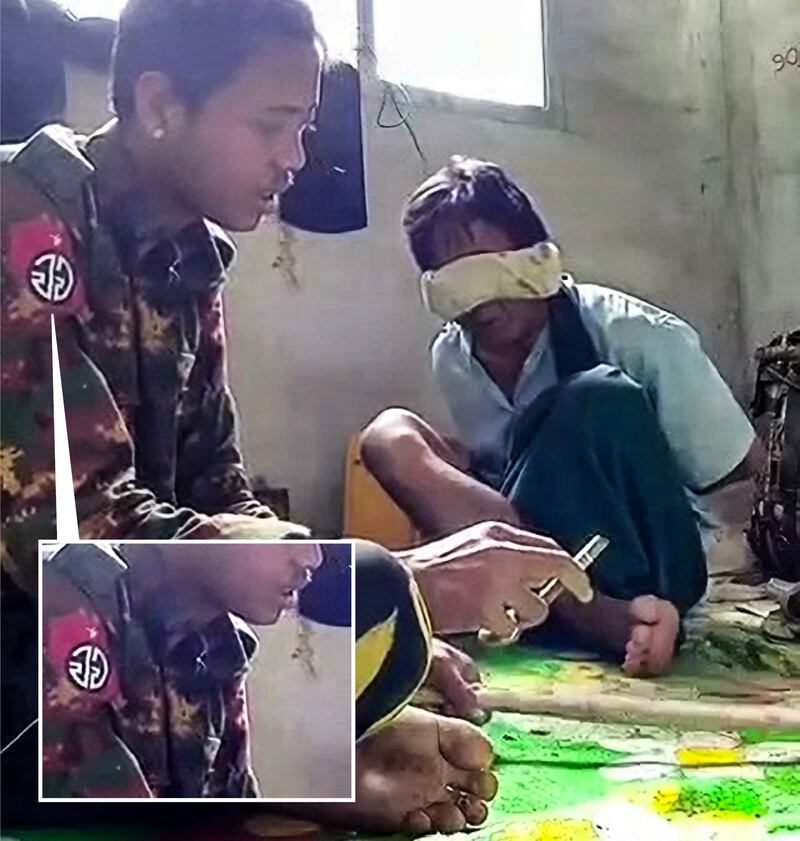စစ်ကောင်စီတပ်သား၏ ယူနီဖောင်းတွင် တပ်မ-၆၆ လက်မောင်းတံဆိပ်ကို တွေ့ရစဉ်။ ဗီဒီယိုရိုက်ကူးစဉ် ဖုန်းကင်မရာ ပြောင်းပြန်ဖြစ်နေသည်ဟု ယူဆရသည်။ (RFA screenshot from video)
