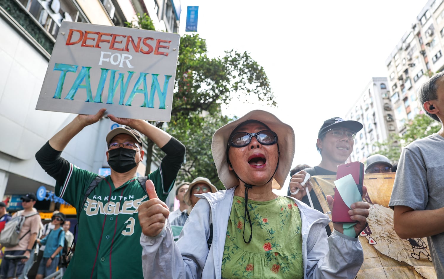 A rally opposing a scaled-down defense budget passed by the legislature in Taipei on May 23, 2026.