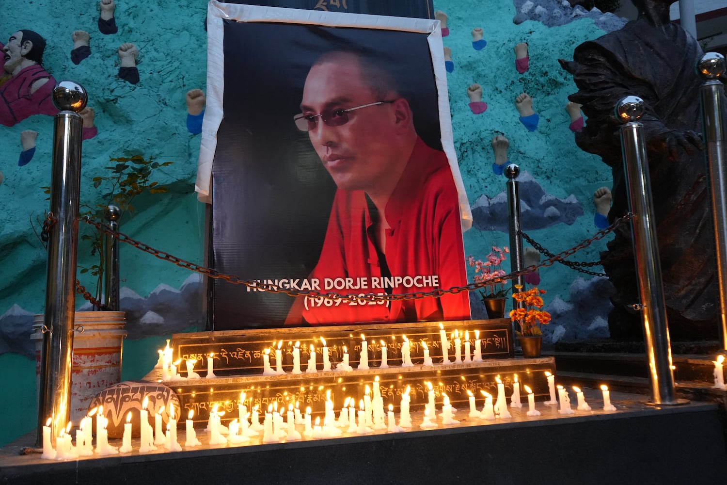 China detains Tibetans for sharing photos of late Buddhist leader