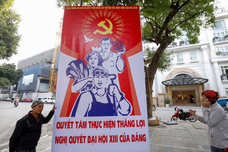 2021-01-12T112129Z_1203558454_RC2B6L9XUMQR_RTRMADP_3_VIETNAM-POLITICS-CONGRESS.JPG