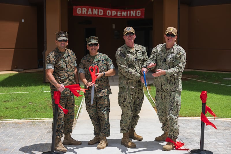 U.S. Marine Corps Base Camp Blaz senior leaders cut a ribbon during a barracks soft opening at the base in Guam, May 16 2025.