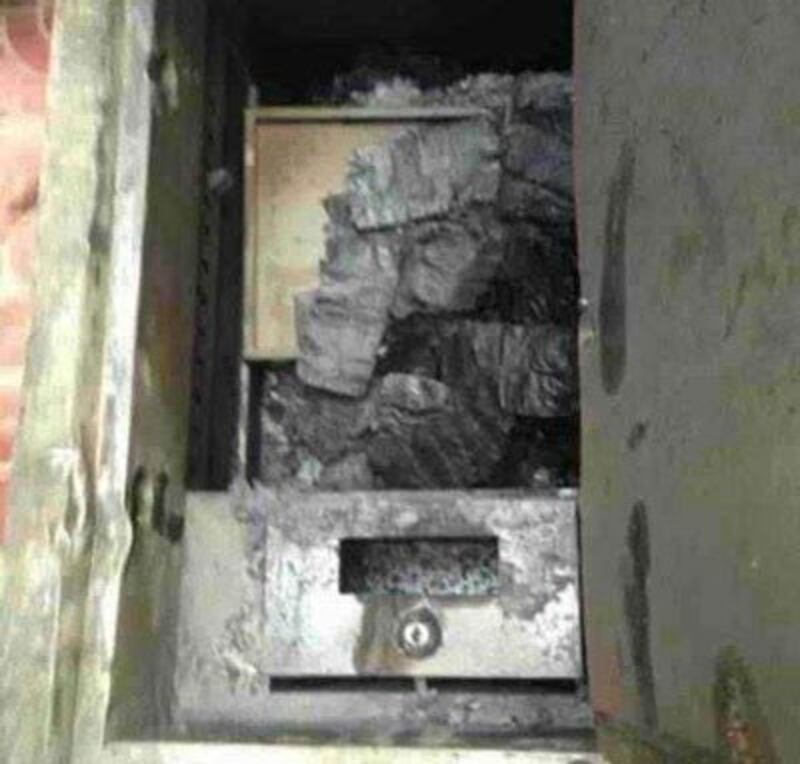 A safe containing what residents say are the charred remains of Chinese currency. Credit: RFA listener