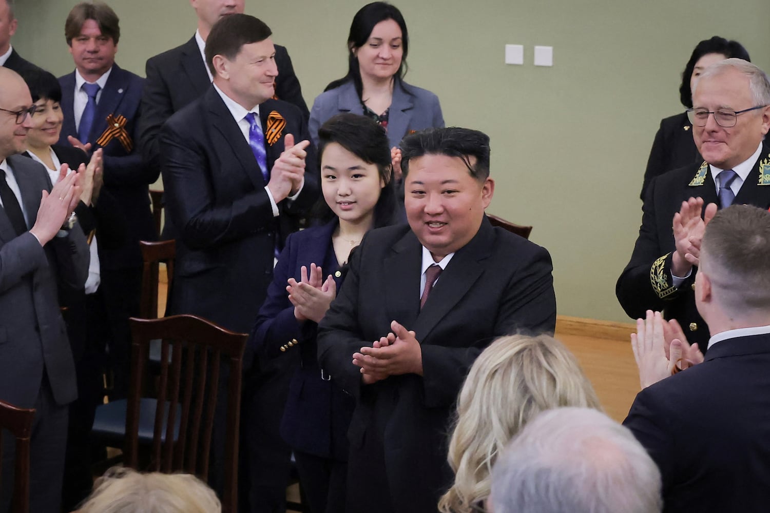 North Korean leader Kim Jong Un attends an event to celebrate Russia's Victory Day with his daughter Kim Ju Ae, at the Russian embassy in Pyongyang, North Korea, May 9, 2025.