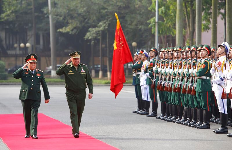 Russian Defense Minister Sergey Shoigu, right, and his then-Vietnamese counterpart Ngo Xuan Lich, left, reviewing an honor guard in Hanoi, Vietnam, Tuesday, Jan. 23, 2018. Shoigu was on a visit to Vietnam to boost military ties between the two countries. Credit: AP