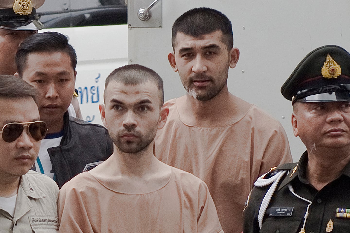 Adem Karadag (alias Bilal Mohammed), left, and Yusufu Mieraili during a Feb.16, 2016, appearance at a Thai military court.