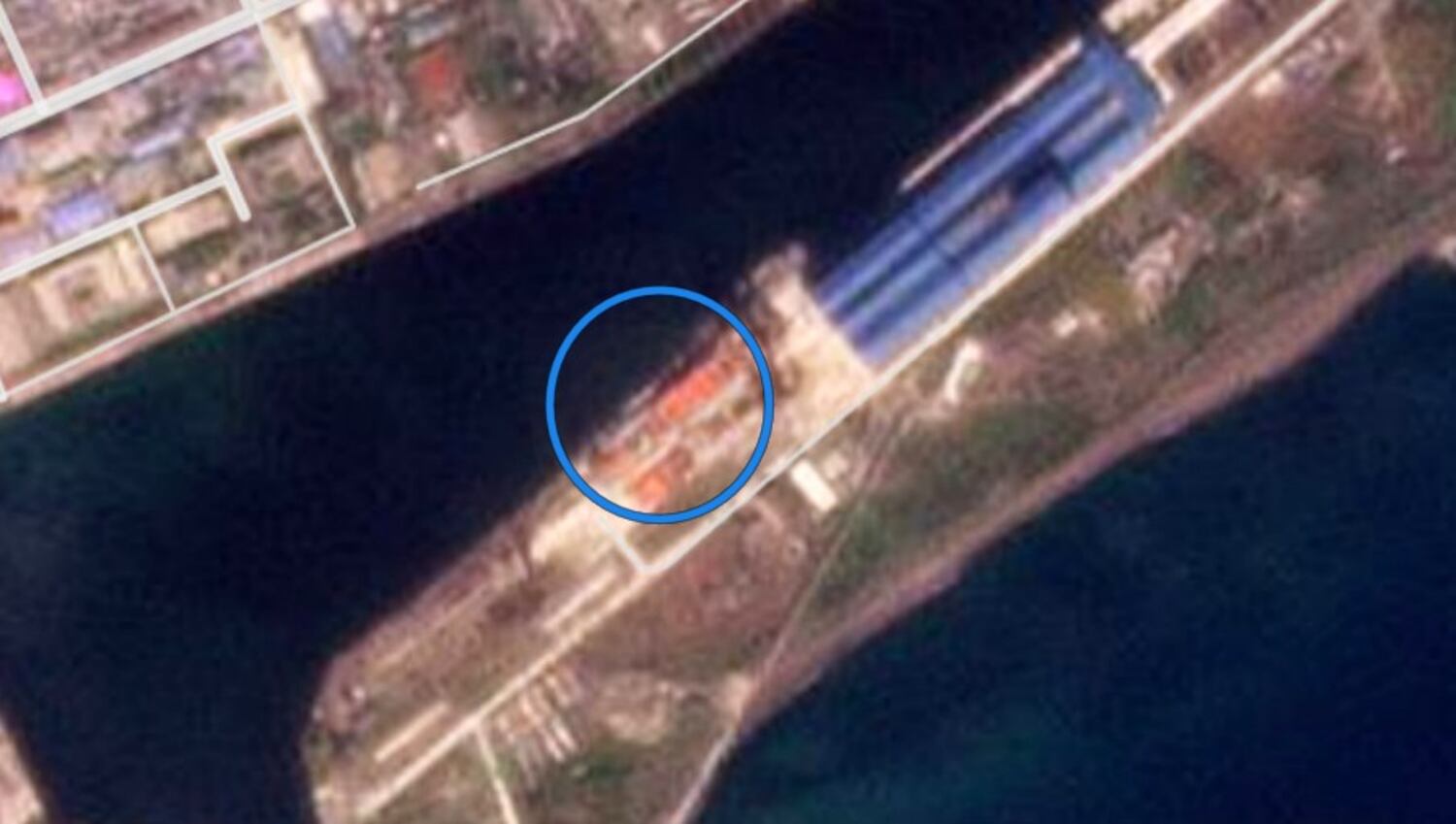 A satellite image shows what is believed to be a new warship built by North Korea in Chongjin Shipyard seen on Oct. 2, 2024. Circled in blue by RFA.