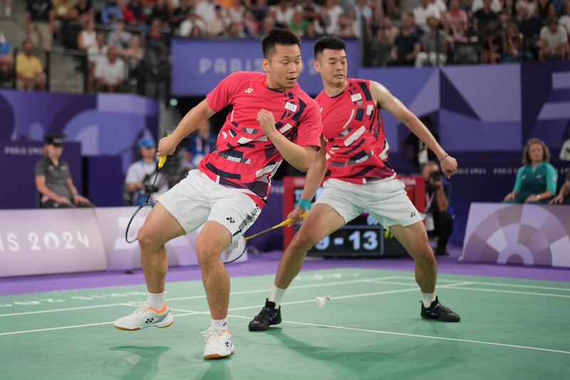 最後一屆參加奧運的李洋（左）夥拍王齊麟爭取衛冕。（法新社圖片）