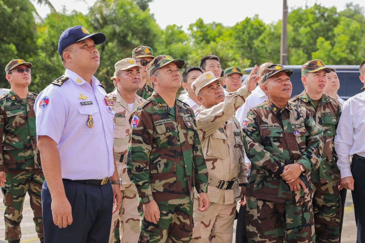 Cambodia’s defense minister Tea Seiha (second left) inspects the Ream naval base on March 15, 2025. To his right is his cousin Tea Sokha, the new navy commander.