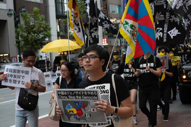葉錦龍表示,趁中國旅客來東京旅遊,向他們展示中共的暴政,讓他們將訊息帶回中國。(張仕仁攝)