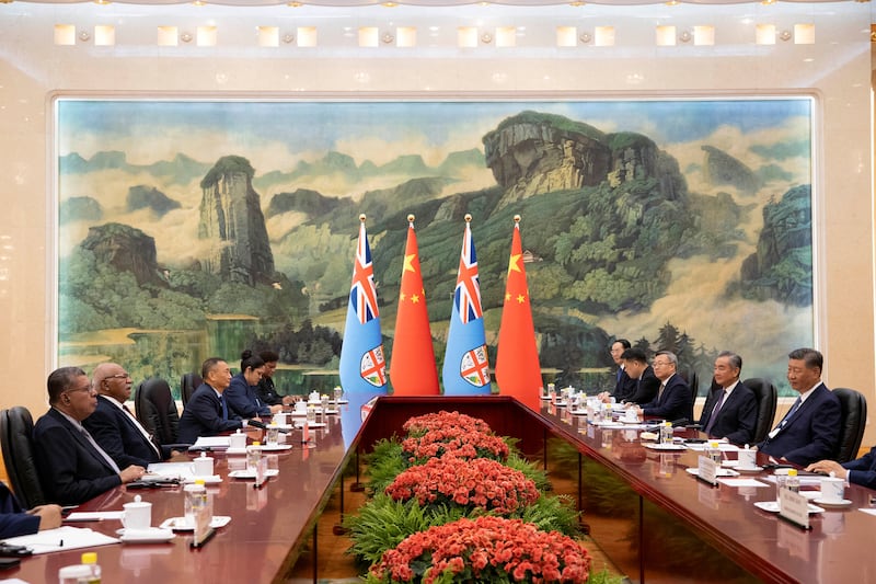 Fiji's Prime Minister Sitiveni Rabuka and Chinese President Xi Jinping attend a meeting at the Great Hall of the People in Beijing, Aug. 20, 2024.