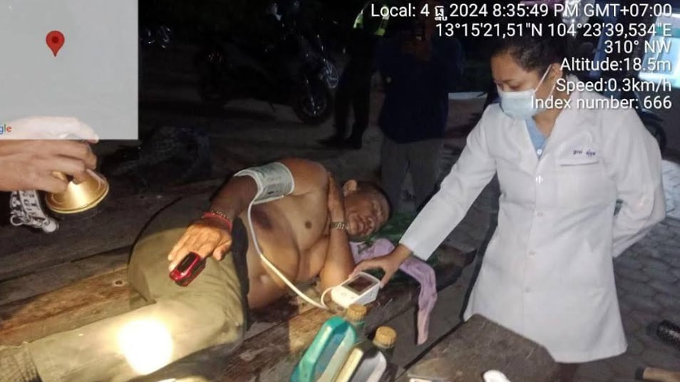 Chhoeung Chheung, 63, lies down after being shot while he was covering a forest clearing operation in the Boeung Per Wildlife Sanctuary in Chikreang district, Cambodia, Dec. 4, 2024