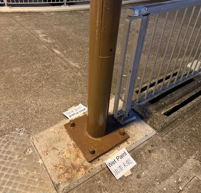 The Hong Kong lamppost is seen after it was repainted and the problematic FA8964 designation changed to an innocuous number.
