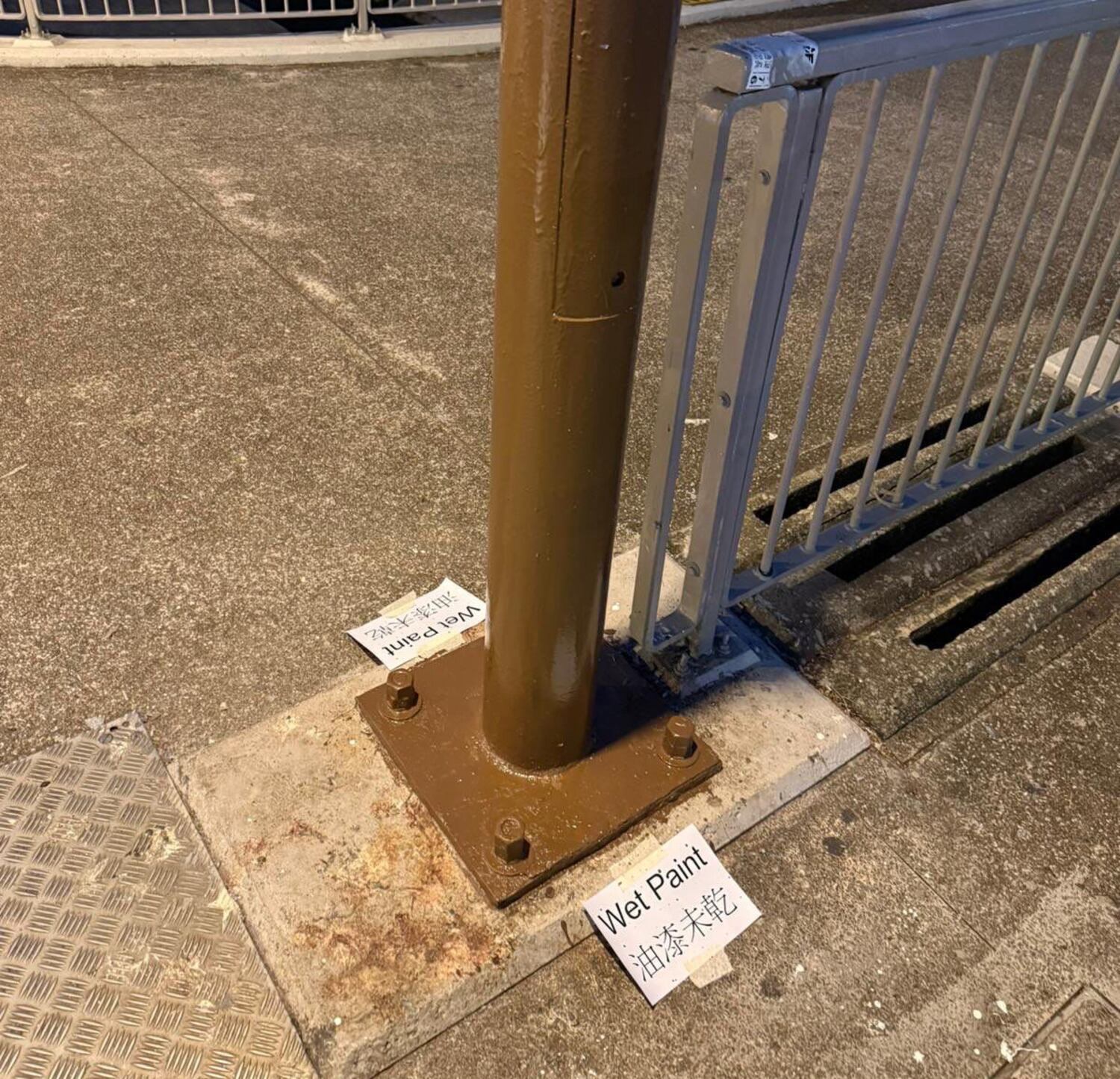 The Hong Kong lamppost is seen after it was repainted and the problematic FA8964 designation changed to an innocuous number.