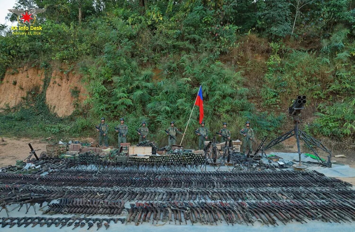 Arakan Army soliders with captured arms and ammunition in a phto posted on the group's website on Feb. 13, 2024.