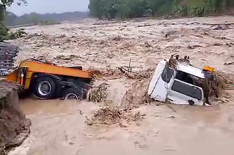 A truck damaged by floodwaters in the Ramazon River in the Tinputz district in Northern Bougainville, an autonomous region in Papua New Guinea, due to heavy rains from tropical cyclone Maila.