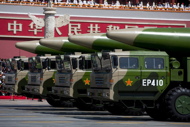 Military vehicles carrying DF-26 ballistic missiles during a military parade at Tiananmen Square in Beijing on Sept. 3, 2015, to mark the 70th anniversary of victory over Japan and the end of World War II. The DF-26 is colloquially called the "Guam Killer" due to its ability to reach the Pacific island U.S. Territory.