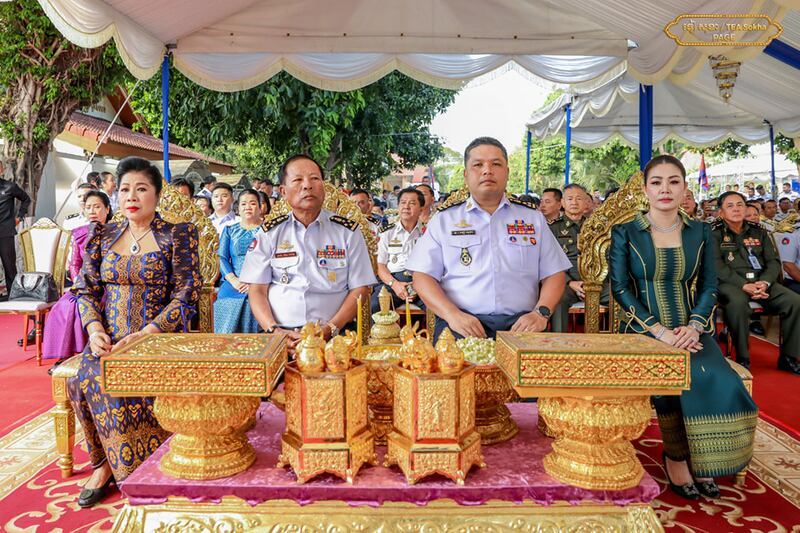 Cambodia's navy chief, Tea Sokha, center, with his father, Tea Vinh, and their wives at a ceremony in Phnom Penh, Feb. 28, 2025.