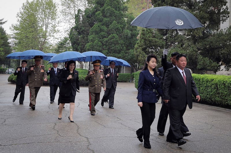 North Korean leader Kim Jong Un attends an event to celebrate Russia's Victory Day with his daughter Kim Ju Ae, at the Russian embassy in Pyongyang, North Korea, May 9, 2025.
